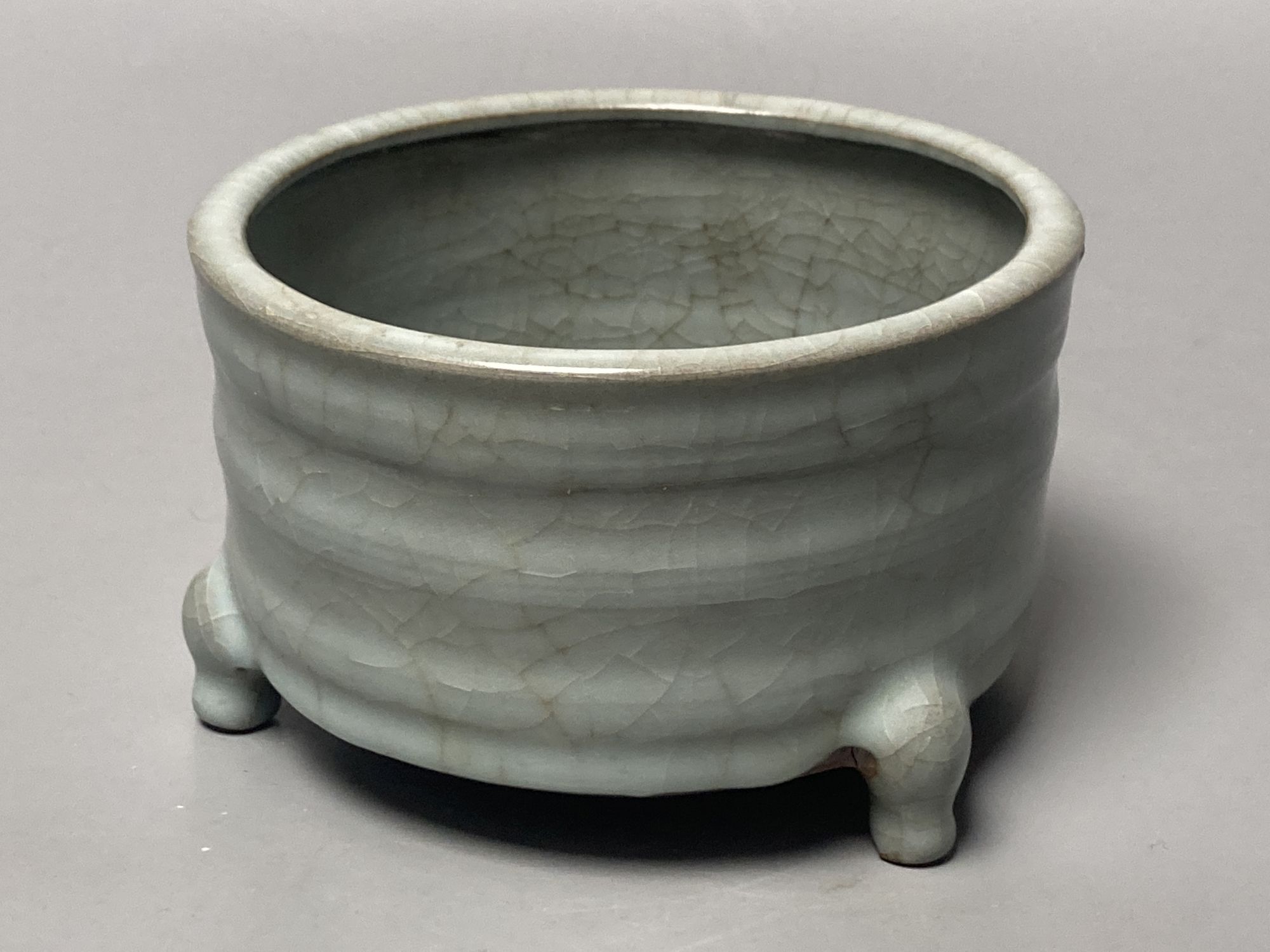 A Chinese celadon cylindrical censer, diameter 13cm